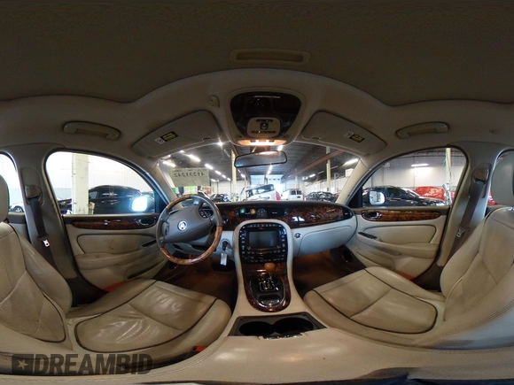 2008 Jaguar XJ Vanden Plas z VIN SAJWA82B28SH29030, wystawiony jako IAAI lot #41231242 z przebiegiem 62 632 mil mil oraz . Historia ofert i sprzedaży dostępna na DreamBid. Obrazek 19.