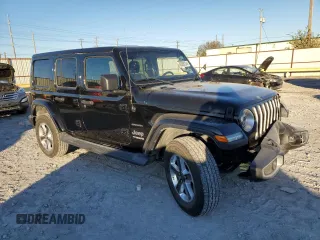 2019 Jeep Wrangler Unlimited Sahara with VIN 1C4HJXEG5KW570347, listed as a Copart auction lot 80388234 with 69,564 mi miles and Salvage Title. Bid and sale history available at carsss.com. Image 4.