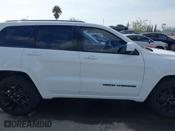 2017 Jeep Grand Cherokee Laredo with VIN 1C4RJEAG8HC896166, listed as a IAAI auction lot 41611979 with 67,257 mi miles and . Bid and sale history available at DreamBid. Image 13.