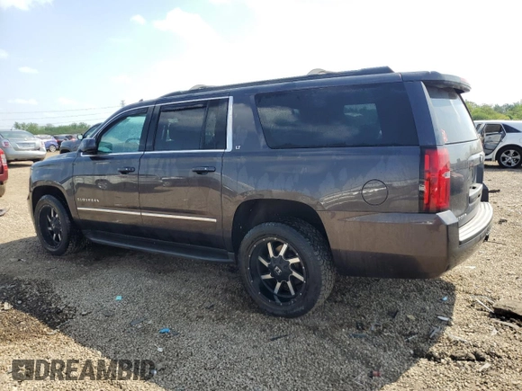 2016 Chevrolet Suburban LT z VIN 1GNSKHKC1GR198058, wystawiony jako Copart lot #56909335 z przebiegiem 150 907 mil mil oraz Szkoda całkowita • Salvage title. Historia ofert i sprzedaży dostępna na DreamBid. Obrazek 2.