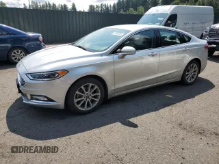 2017 Ford Fusion SE with VIN 3FA6P0HD4HR187841, listed as a Copart auction lot 61766415 with 74,303 mi miles and Salvage title. Bid and sale history available at DreamBid. Image 1.