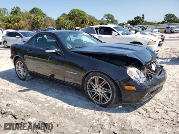 2002 Mercedes-Benz SLK-Class 2.3L Kompressor with VIN WDBKK49F02F269048, listed as a Copart auction lot 74830014 with 192,603 mi miles and Salvage Title. Bid and sale history available at carsss.com. Image 1.