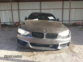 2015 BMW 4 Series 428i with VIN WBA4A5C54FG051307, listed as a IAAI auction lot 41774596 with 126,852 mi miles and . Bid and sale history available at carsss.com. Image 12.