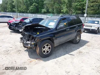 2000 Jeep Grand Cherokee Laredo with VIN 1J4G248SXYC365442, listed as a IAAI auction lot 42285521 with Not provided miles and . Bid and sale history available at DreamBid. Image 2.