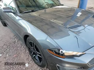 2023 Ford Mustang EcoBoost z VIN 1FA6P8TH3P5110730, wystawiony jako Copart lot #53877775 z przebiegiem 31 477 mil mil oraz Szkoda całkowita • Salvage title. Historia ofert i sprzedaży dostępna na DreamBid. Obrazek 13.