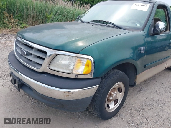2000 Ford F-150 XL with VIN 1FTRF17W4YNB25801, listed as a IAAI auction lot 42461063 with 173,000 mi miles and . Bid and sale history available at DreamBid. Image 13.