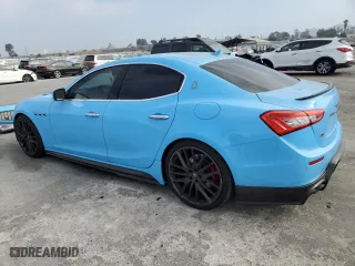 2014 Maserati Ghibli S Q4 with VIN ZAM57RTA7E1089301, listed as a Copart auction lot 69271994 with 58,318 mi miles and Salvage Title. Bid and sale history available at carsss.com. Image 2.