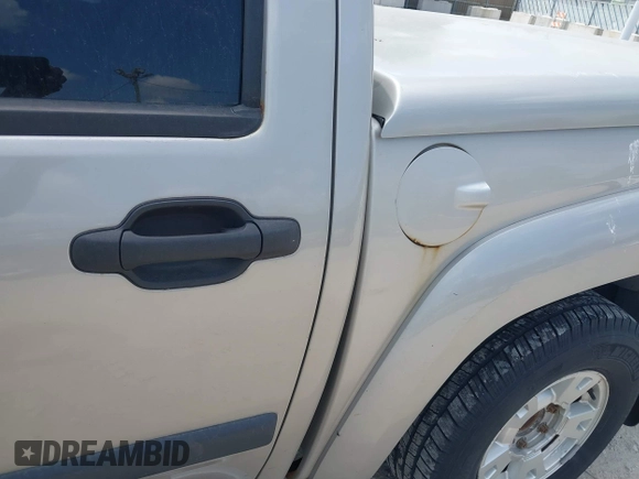 2005 Chevrolet Colorado 1SE LS Z71 z VIN 1GCDS136158269022, wystawiony jako IAAI lot #42250305 z przebiegiem 171 259 mil mil oraz . Historia ofert i sprzedaży dostępna na DreamBid. Obrazek 6.