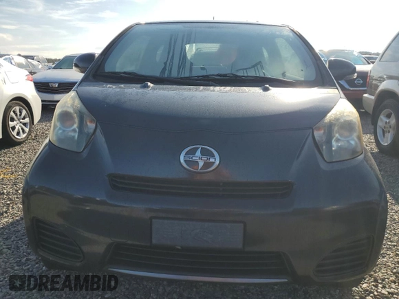 2013 Scion iQ with VIN JTNJJXB04DJ022845, listed as a Copart auction lot 73722044 with 25,108 mi miles and Salvage title. Bid and sale history available at DreamBid. Image 5.