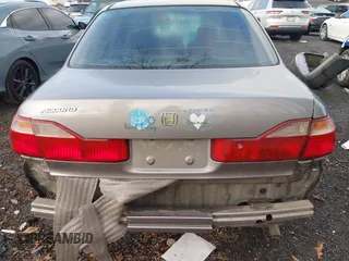 2000 Honda Accord EX z VIN 1HGCG5651YA129056, wystawiony jako IAAI lot #41532787 z przebiegiem Nie podano mil oraz . Historia ofert i sprzedaży dostępna na DreamBid. Obrazek 16.