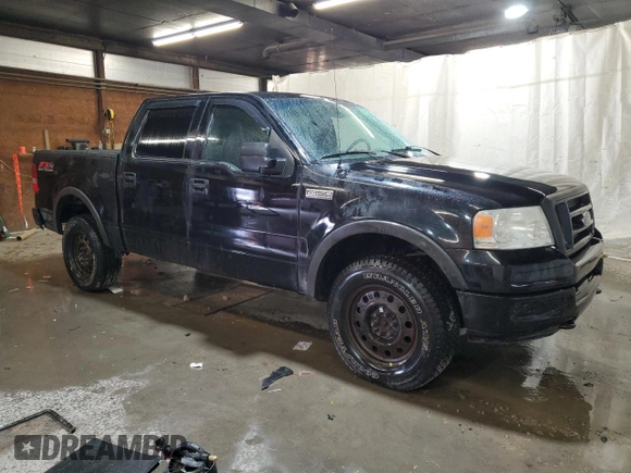 2004 Ford F-150 XLT with VIN 1FTPW14574KD92462, listed as a Copart auction lot 49881835 with 149,643 mi miles and Salvage Title. Bid and sale history available at carsss.com. Image 4.