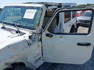 2019 Jeep Wrangler Unlimited Sahara with VIN 1C4HJXEN5KW509806, listed as a IAAI auction lot 42071325 with 95,549 mi miles and . Bid and sale history available at DreamBid. Image 19.