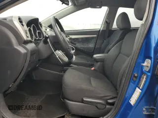 2009 Toyota Matrix S with VIN 2T1LE40E29C011912, listed as a Copart auction lot 57103465 with 128,900 mi miles and Salvage title. Bid and sale history available at DreamBid. Image 7.