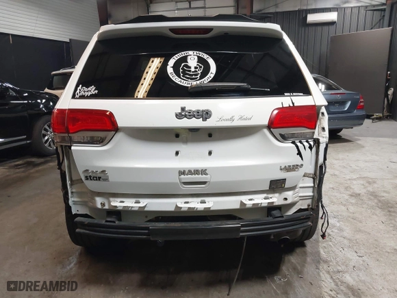 2015 Jeep Grand Cherokee Altitude with VIN 1C4RJFAG7FC932917, listed as a IAAI auction lot 41849526 with 91,827 mi miles. Bid and sale history available at carsss.com. Image 17.