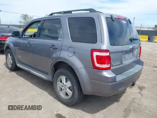 2008 Ford Escape XLT with VIN 1FMCU93128KA42482, listed as a IAAI auction lot 41979106 with 292,130 mi miles. Bid and sale history available at carsss.com. Image 3.