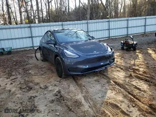 2023 Tesla Model Y Long Range with VIN 7SAYGDEE6PA081723, listed as a Copart auction lot 87232354 with 28,774 mi miles and Salvage Title. Bid and sale history available at carsss.com. Image 11.