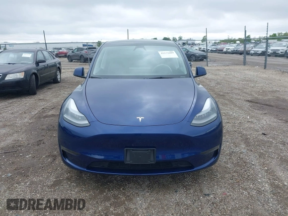 2023 Tesla Model Y Long Range z VIN 7SAYGDEE0PF840787, wystawiony jako IAAI lot #42172489 z przebiegiem 16 314 mil mil oraz . Historia ofert i sprzedaży dostępna na DreamBid. Obrazek 13.
