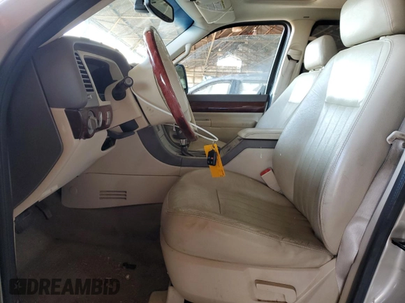 2004 Lincoln Aviator Luxury z VIN 5LMEU68HX4ZJ09938, wystawiony jako Copart lot #52117635 z przebiegiem 147 801 mil mil oraz Szkoda całkowita • Salvage title. Historia ofert i sprzedaży dostępna na DreamBid. Obrazek 7.