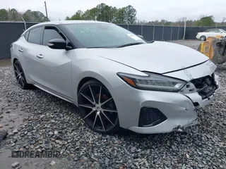2020 Nissan Maxima SV with VIN 1N4AA6CV0LC371003, listed as a IAAI auction lot 41557058 with 31,730 mi miles. Bid and sale history available at carsss.com. Image 1.
