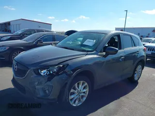 2014 Mazda CX-5 Grand Touring with VIN JM3KE4DY1E0364685, listed as a IAAI auction lot 41665349 with 135,751 mi miles. Bid and sale history available at carsss.com. Image 17.
