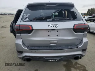 2017 Jeep Grand Cherokee SRT with VIN 1C4RJFDJ8HC663059, listed as a Copart auction lot 45677045 with 88,914 mi miles and Salvage Title. Bid and sale history available at carsss.com. Image 6.
