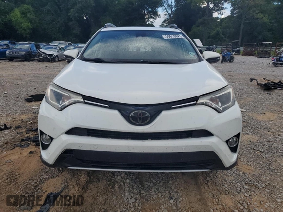 2018 Toyota RAV4 XLE with VIN JTMWFREV0JJ204150, listed as a Copart auction lot 59610825 with 34,730 mi miles and Salvage title. Bid and sale history available at DreamBid. Image 5.