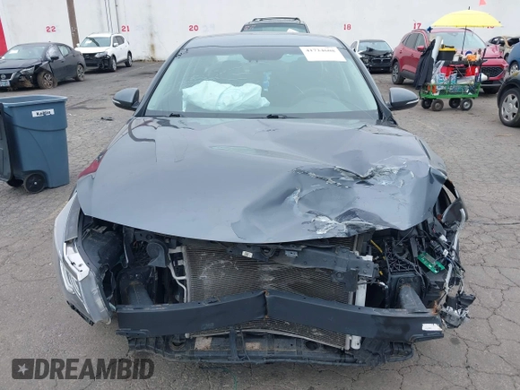 2020 Kia Optima SE z VIN 5XXGT4L35LG423369, wystawiony jako IAAI lot #41724608 z przebiegiem 91 464 mil mil oraz . Historia ofert i sprzedaży dostępna na DreamBid. Obrazek 13.