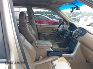 2005 Honda Pilot EX-L z VIN 5FNYF18675B014213, wystawiony jako IAAI lot #42345259 z przebiegiem 244 510 mil mil oraz . Historia ofert i sprzedaży dostępna na DreamBid. Obrazek 5.