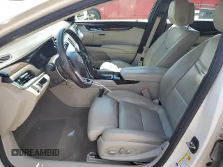 2014 Cadillac XTS Luxury z VIN 2G61M5S33E9193905, wystawiony jako Copart lot #55479605 z przebiegiem 143 006 mil mil oraz Szkoda całkowita • Salvage title. Historia ofert i sprzedaży dostępna na DreamBid. Obrazek 7.