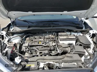 2023 Toyota Corolla Cross XLE with VIN 7MUDAAAG2PV042957, listed as a Copart auction lot 60301555 with 39,211 mi miles and Salvage title. Bid and sale history available at DreamBid. Image 12.