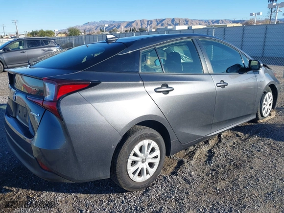 2020 Toyota Prius L Eco with VIN JTDKARFU2L3120891, listed as a IAAI auction lot 41318597 with 79,848 mi miles. Bid and sale history available at carsss.com. Image 4.