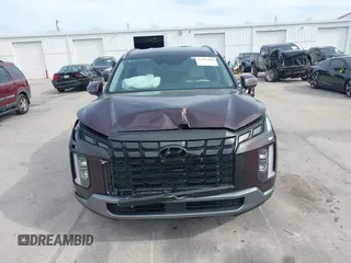 2023 Hyundai Palisade Limited z VIN KM8R54GE0PU517573, wystawiony jako IAAI lot #41870400 z przebiegiem 11 477 mil mil oraz . Historia ofert i sprzedaży dostępna na DreamBid. Obrazek 12.