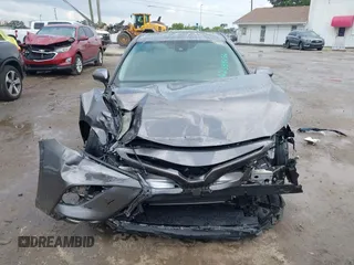 2023 Toyota Camry SE z VIN 4T1T11AK8PU802097, wystawiony jako IAAI lot #42389754 z przebiegiem 19 732 mil mil oraz . Historia ofert i sprzedaży dostępna na DreamBid. Obrazek 6.