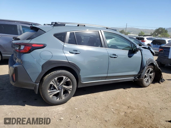2024 Subaru Crosstrek Premium z VIN JF2GUADC9R8305042, wystawiony jako Copart lot #55796805 z przebiegiem 9 518 mil mil oraz Szkoda całkowita • Salvage title. Historia ofert i sprzedaży dostępna na DreamBid. Obrazek 3.
