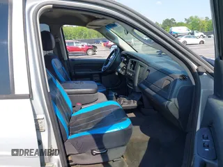 2003 Dodge 1500 ST z VIN 1D7HU18D93S346244, wystawiony jako IAAI lot #41998278 z przebiegiem 158 345 mil mil oraz . Historia ofert i sprzedaży dostępna na DreamBid. Obrazek 5.