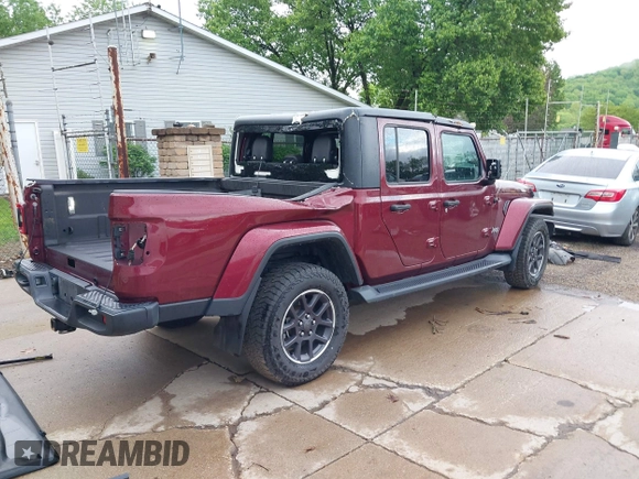 2021 Jeep Gladiator Overland with VIN 1C6HJTFGXML555622, listed as a IAAI auction lot 42237686 with 62,358 mi miles and . Bid and sale history available at DreamBid. Image 4.