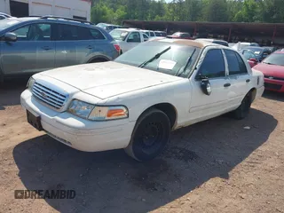 2001 Ford Crown Victoria Police Interceptor z VIN 2FAFP71W21X165218, wystawiony jako IAAI lot #42062199 z przebiegiem 233 978 mil mil oraz . Historia ofert i sprzedaży dostępna na DreamBid. Obrazek 19.