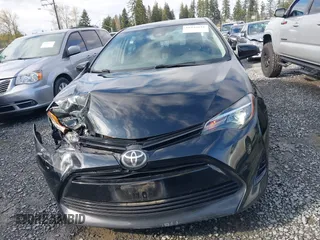 2018 Toyota Corolla L z VIN 2T1BURHEXJC098138, wystawiony jako IAAI lot #41935621 z przebiegiem 103 937 mil mil oraz . Historia ofert i sprzedaży dostępna na DreamBid. Obrazek 12.