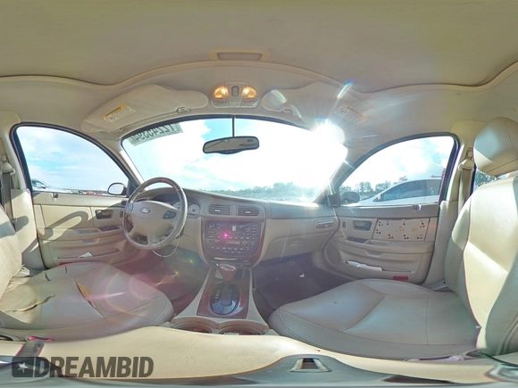 2003 Ford Taurus SEL Deluxe with VIN 1FAHP56SX3A243775, listed as a Copart auction lot 72245394 with 251,041 mi miles and Salvage Title. Bid and sale history available at DreamBid. Image 12.