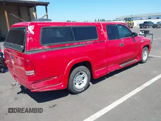 2000 Dodge Dakota z VIN 1B7GL22X8YS763265, wystawiony jako IAAI lot #42392871 z przebiegiem 195 909 mil mil oraz . Historia ofert i sprzedaży dostępna na DreamBid. Obrazek 4.