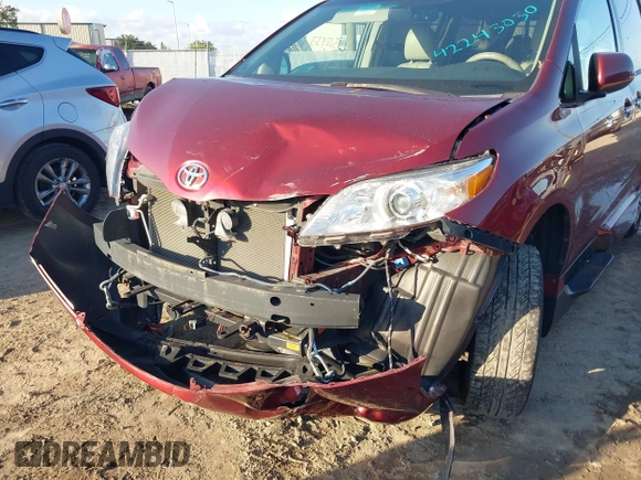 2014 Toyota Sienna XLE with VIN 5TDYK3DCXES473671, listed as a IAAI auction lot 42243030 with 70,052 mi miles and . Bid and sale history available at DreamBid. Image 6.