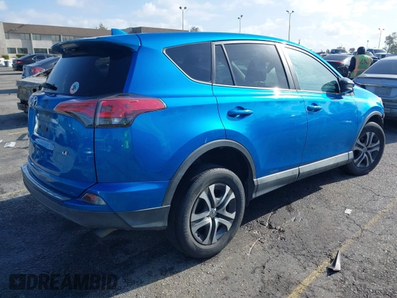 2018 Toyota RAV4 LE with VIN 2T3ZFREV9JW442691, listed as a IAAI auction lot 41946423 with 133,856 mi miles. Bid and sale history available at carsss.com. Image 4.