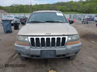 2000 Jeep Grand Cherokee Laredo with VIN 1J4GW48SXYC100248, listed as a IAAI auction lot 42182318 with 227,658 mi miles and . Bid and sale history available at DreamBid. Image 12.