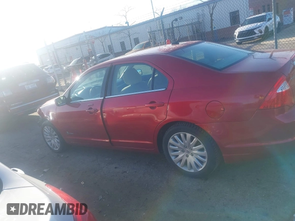 2011 Ford Fusion Hybrid with VIN 3FADP0L3XBR342051, listed as a IAAI auction lot 41880330 with 118,776 mi miles and . Bid and sale history available at DreamBid. Image 14.