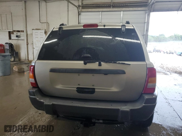 2002 Jeep Grand Cherokee Limited z VIN 1J8GW58S02C279251, wystawiony jako Copart lot #61563465 z przebiegiem 182 244 mil mil oraz Szkoda całkowita • Salvage title. Historia ofert i sprzedaży dostępna na DreamBid. Obrazek 6.