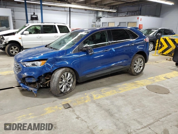 2021 Ford Edge Titanium with VIN 2FMPK4K98MBA18841, listed as a Copart auction lot 56207745 with 69,249 mi miles and Salvage title. Bid and sale history available at DreamBid. Image 1.