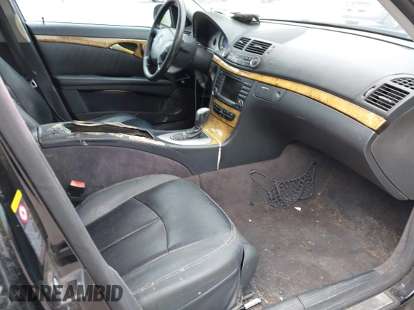 2006 Mercedes-Benz E-Class 3.5L with VIN WDBUF56J16A904485, listed as a IAAI auction lot 42063443 with 226,594 mi miles. Bid and sale history available at carsss.com. Image 5.