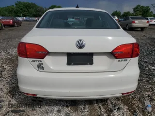 2012 Volkswagen Jetta SE with VIN 3VWDX7AJ3CM472074, listed as a Copart auction lot 61433125 with 185,861 mi miles and Salvage title. Bid and sale history available at DreamBid. Image 6.