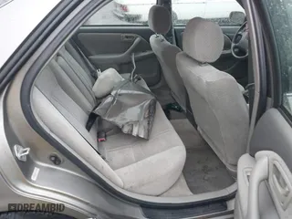 2000 Toyota Camry CE with VIN 4T1BG22K4YU678040, listed as a IAAI auction lot 42012146 with 112,714 mi miles. Bid and sale history available at carsss.com. Image 8.