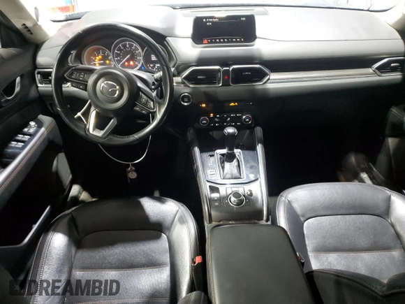 2018 Mazda CX-5 Grand Touring with VIN JM3KFBDM1J0304706, listed as a Copart auction lot 46123415 with 104,004 mi miles and Salvage title. Bid and sale history available at DreamBid. Image 8.